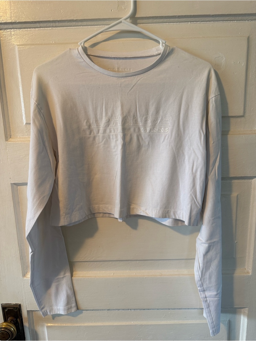 Alphalete Cropped Long-Sleeve Top in White
